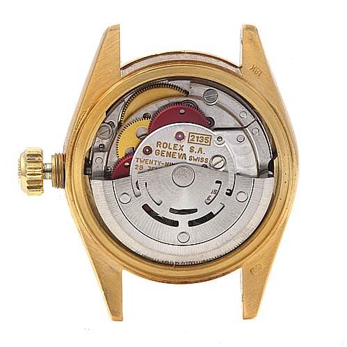 The image shows the back view of a Rolex President 69068 Women's Yellow Gold Black Dial 69068 Women's Yellow Gold Black Dial model watch, highlighting its internal movement components.
