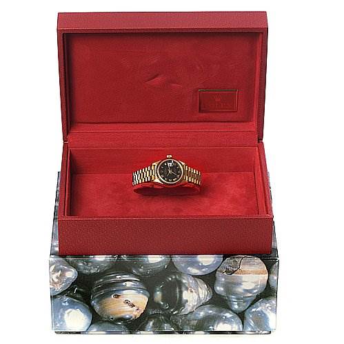 The image shows a Rolex President 69068 Women's Yellow Gold Black Dial 69068 Women's Yellow Gold Black Dial model watch in a red cushioned box, viewed from a front angle.