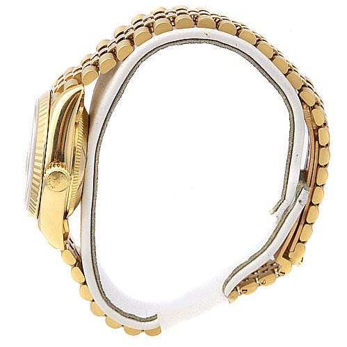 The image shows a side view of a Rolex President 69178 Women
s Yellow Gold Champagne Dial 69178 Women
s Yellow Gold Champagne Dial model watch, highlighting the gold case, crown, and linked bracelet.