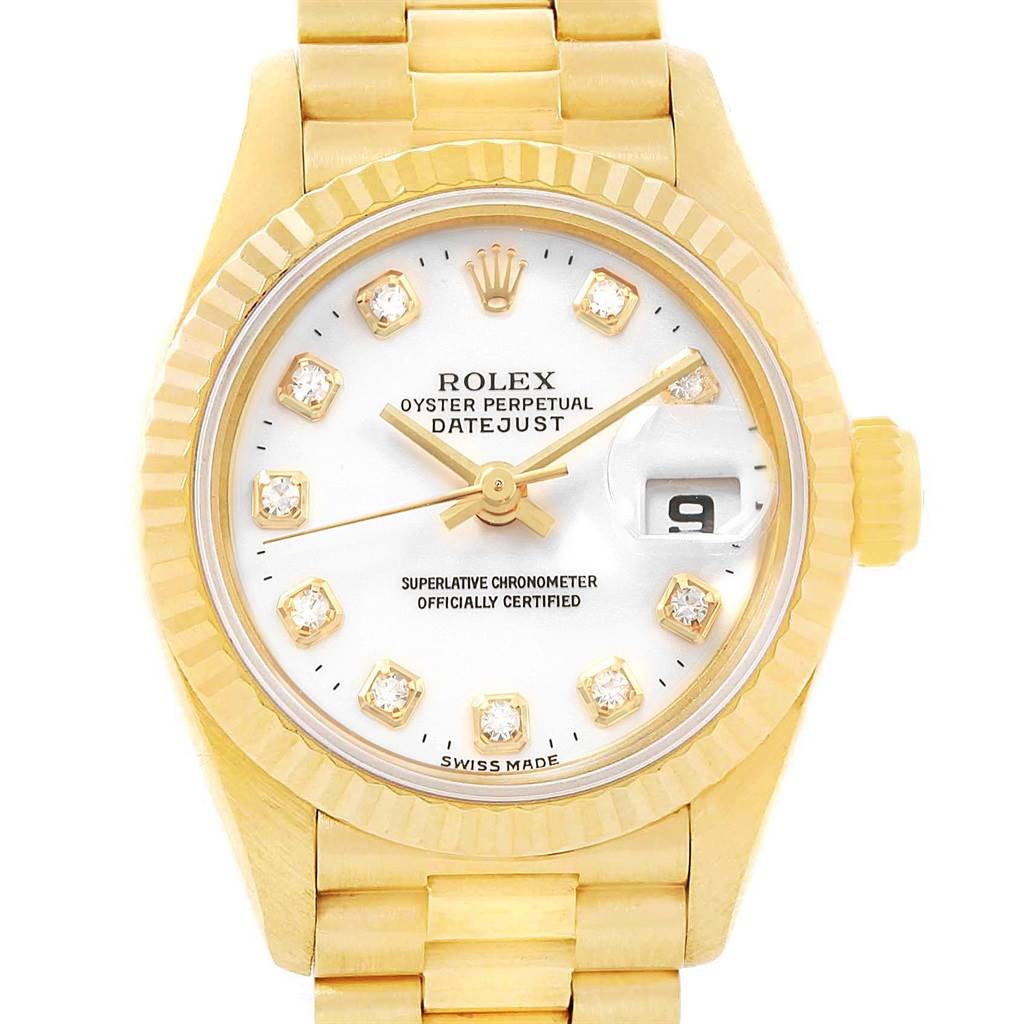 The image shows a front view of the Rolex President 69178 Women's Yellow Gold White Dial 69178 Women's Yellow Gold White Dial model watch, featuring a diamond-encrusted dial and a fluted bezel.
