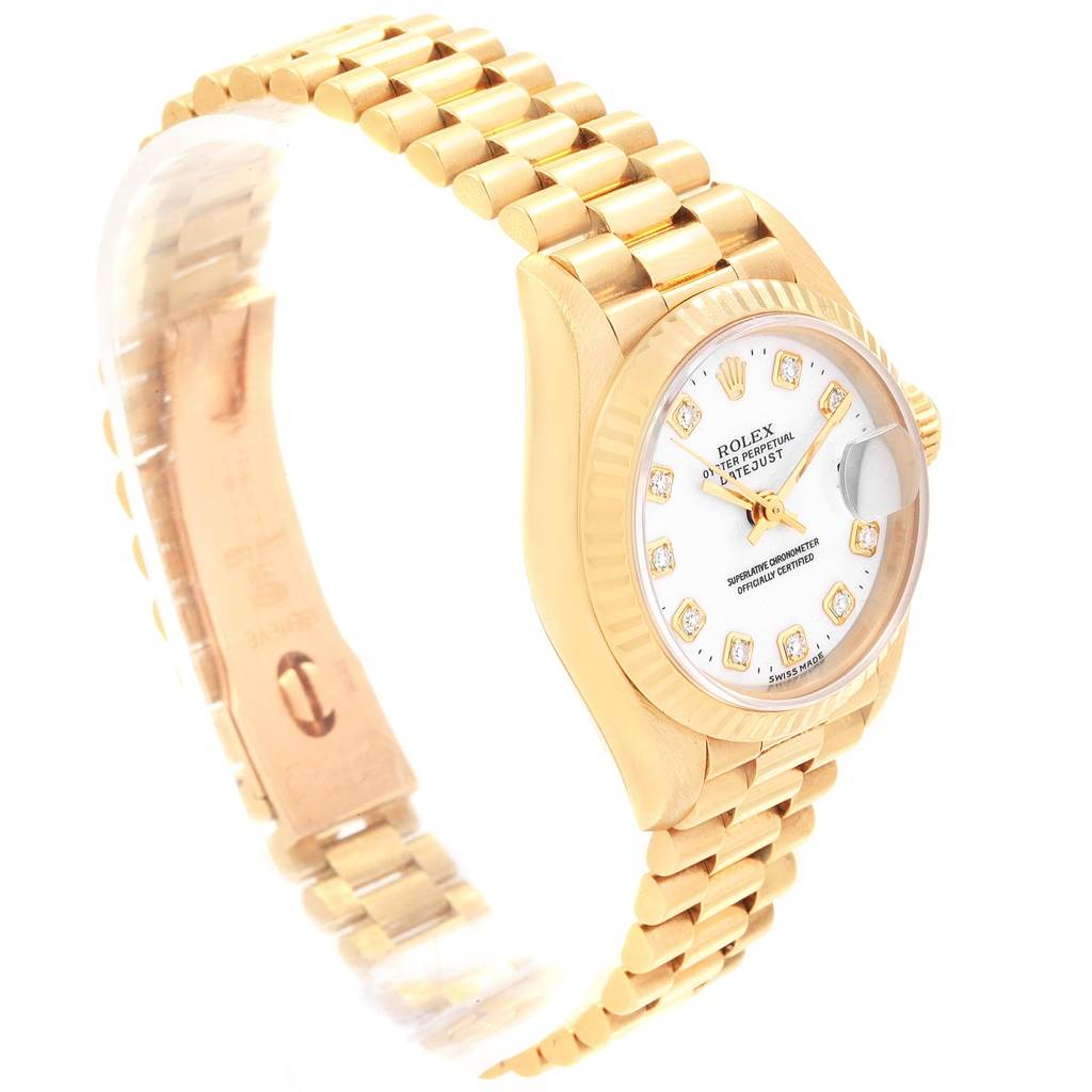 The image shows a Rolex President 69178 Women's Yellow Gold White Dial 69178 Women's Yellow Gold White Dial model watch with a gold case, bracelet, and a diamond-accented dial, viewed from a 3/4 angle.