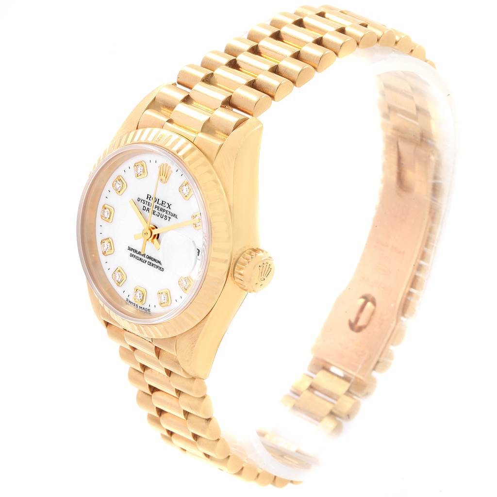 This image shows a side angle of a Rolex President 69178 Women's Yellow Gold White Dial 69178 Women's Yellow Gold White Dial model watch, focusing on the dial, bezel, crown, and bracelet.