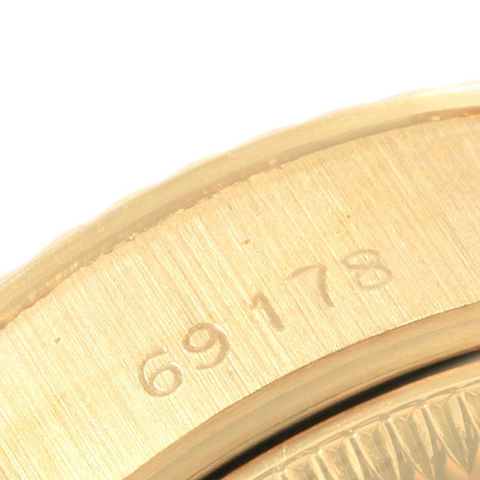 This is a close-up showing the model number "69178" on the bezel of a Rolex President 69178 Women's Yellow Gold Black Dial 69178 Women's Yellow Gold Black Dial watch.