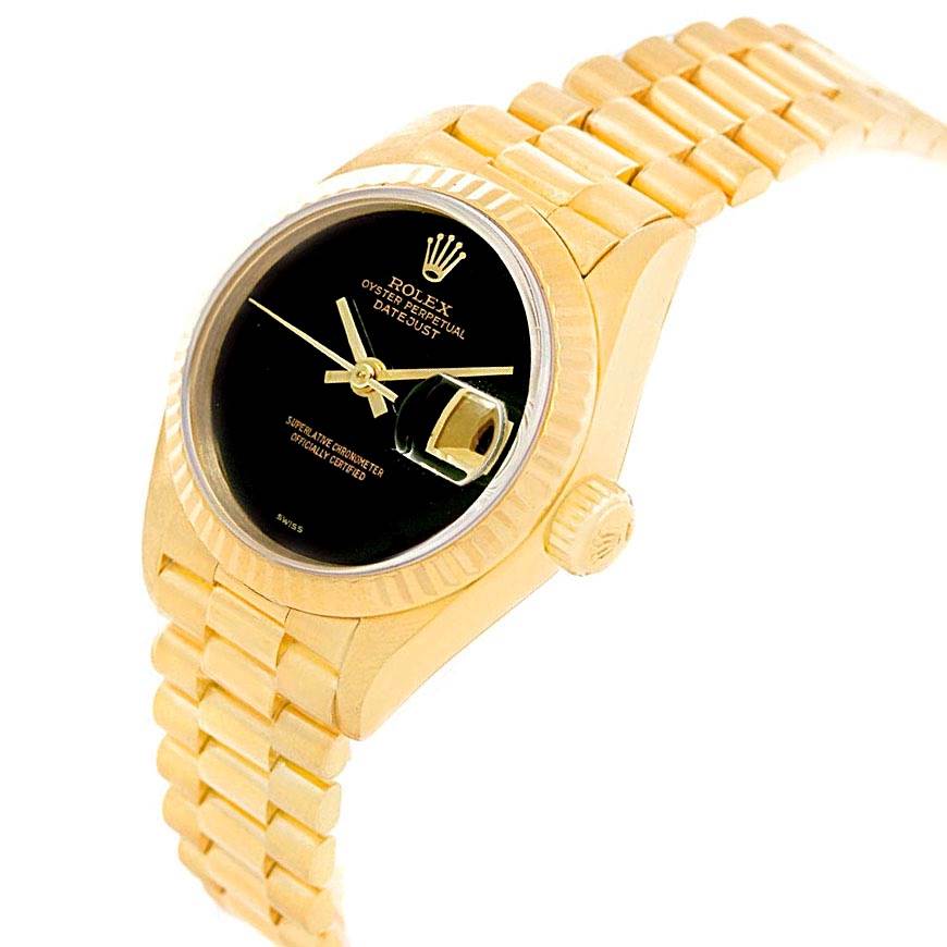 This image displays the front and partial side view of a Rolex President 69178 Women's Yellow Gold Black Dial 69178 Women's Yellow Gold Black Dial model watch, showing its face, bezel, and bracelet.