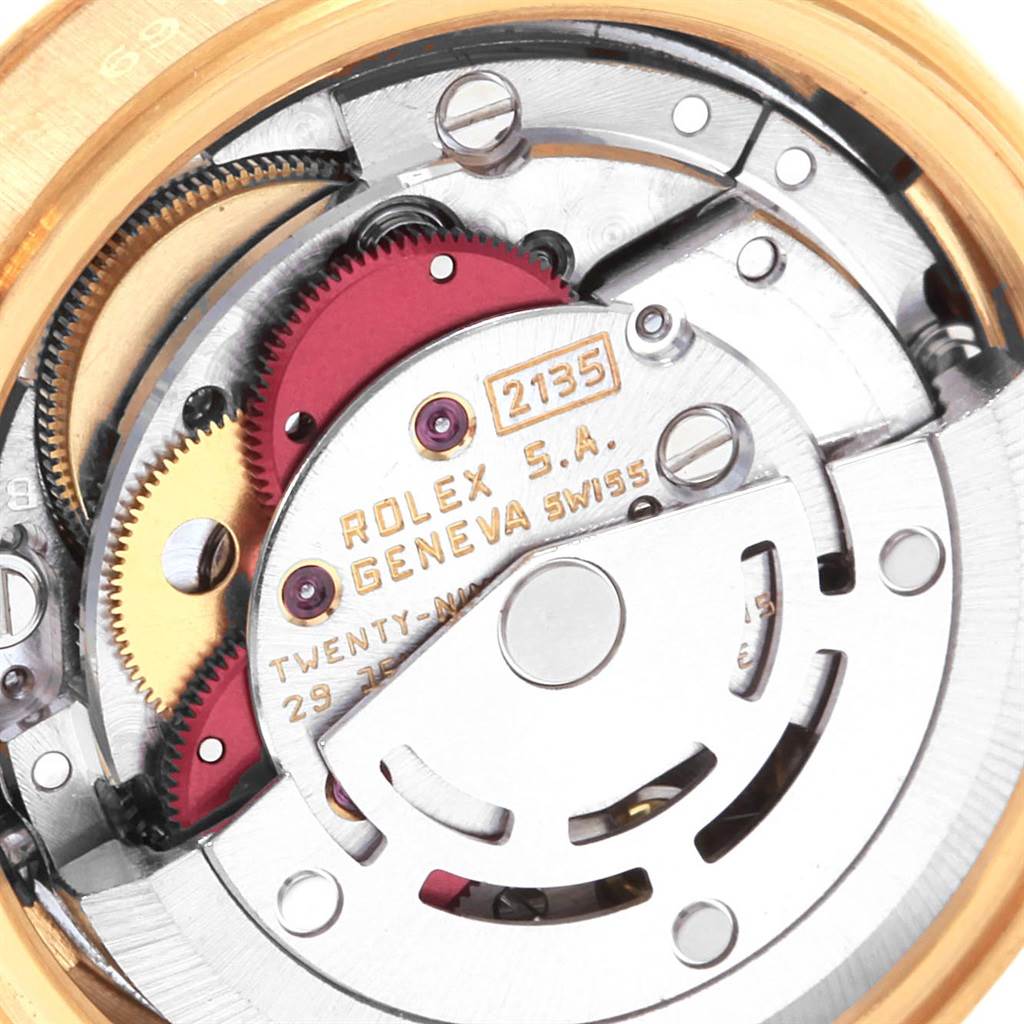 This close-up image shows the internal mechanical movement parts of a Rolex President 69178 Women's Yellow Gold Black Dial 69178 Women's Yellow Gold Black Dial model watch.