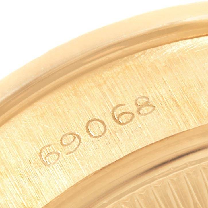 The image shows a close-up of the back casing of a Rolex President 69068 Women's Yellow Gold Champagne Dial 69068 Women's Yellow Gold Champagne Dial model watch, displaying the model number "69068."