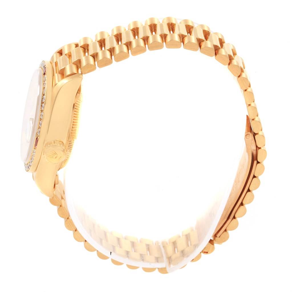 This image shows a side view of the Rolex President 69068 Women's Yellow Gold Champagne Dial 69068 Women's Yellow Gold Champagne Dial model watch, highlighting its gold bracelet and case.