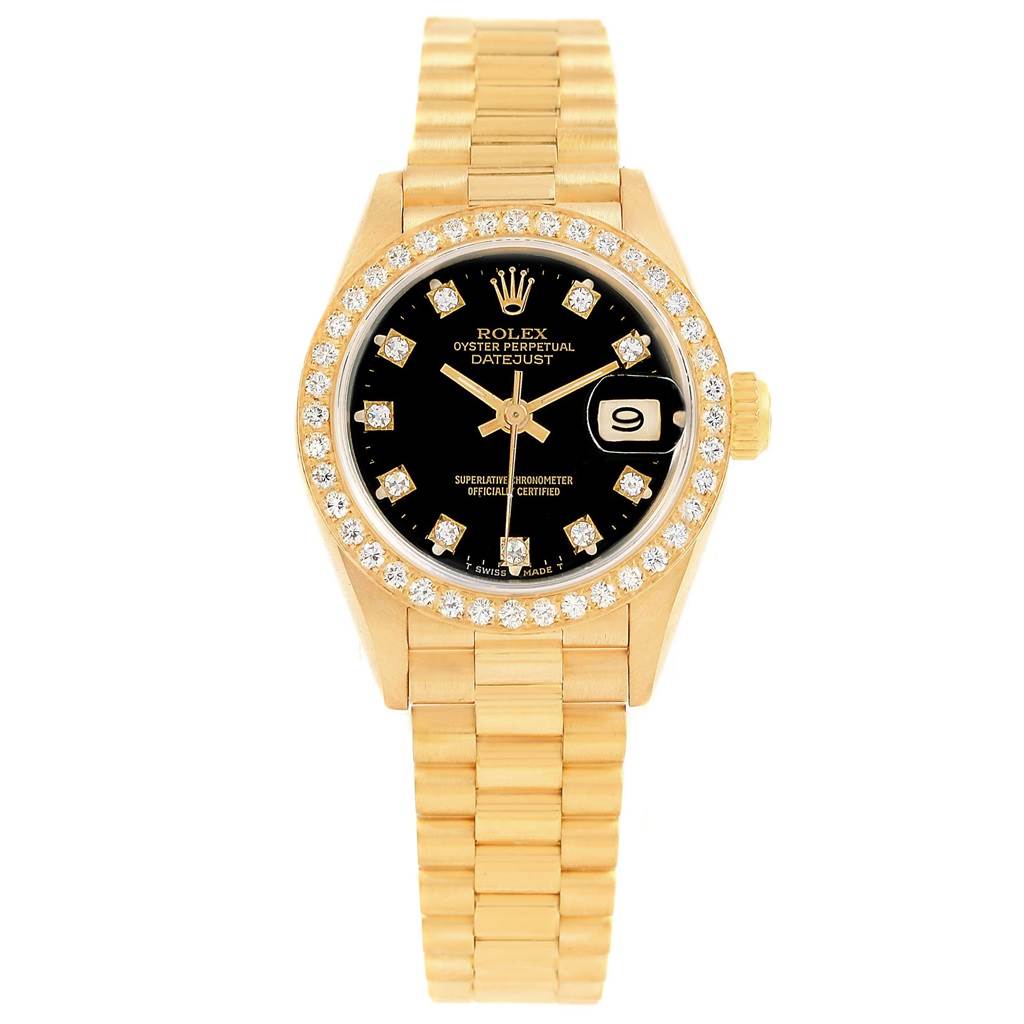 The image shows a front view of the Rolex President 69138 Women
s Yellow Gold Black Dial 69138 Women
s Yellow Gold Black Dial model watch, displaying its gold band, black dial, and diamond bezel.