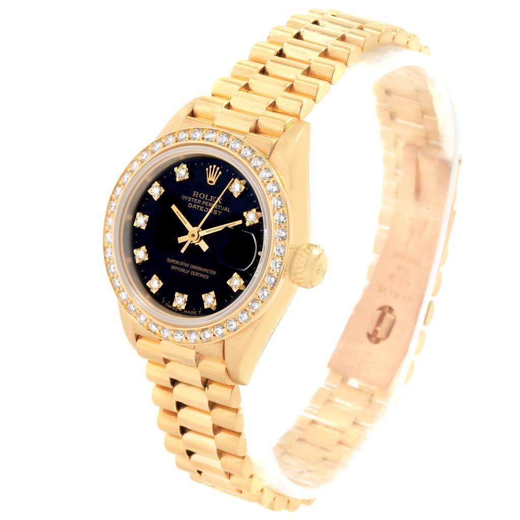 The Rolex President 69138 Women
s Yellow Gold Black Dial 69138 Women
s Yellow Gold Black Dial model watch is shown from a slight top angle, displaying the face, bezel, and full bracelet.