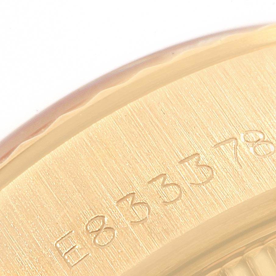 This image shows a close-up of the edge and serial number engraving on the Rolex President 69178 Women's Yellow Gold White Dial 69178 Women's Yellow Gold White Dial watch.