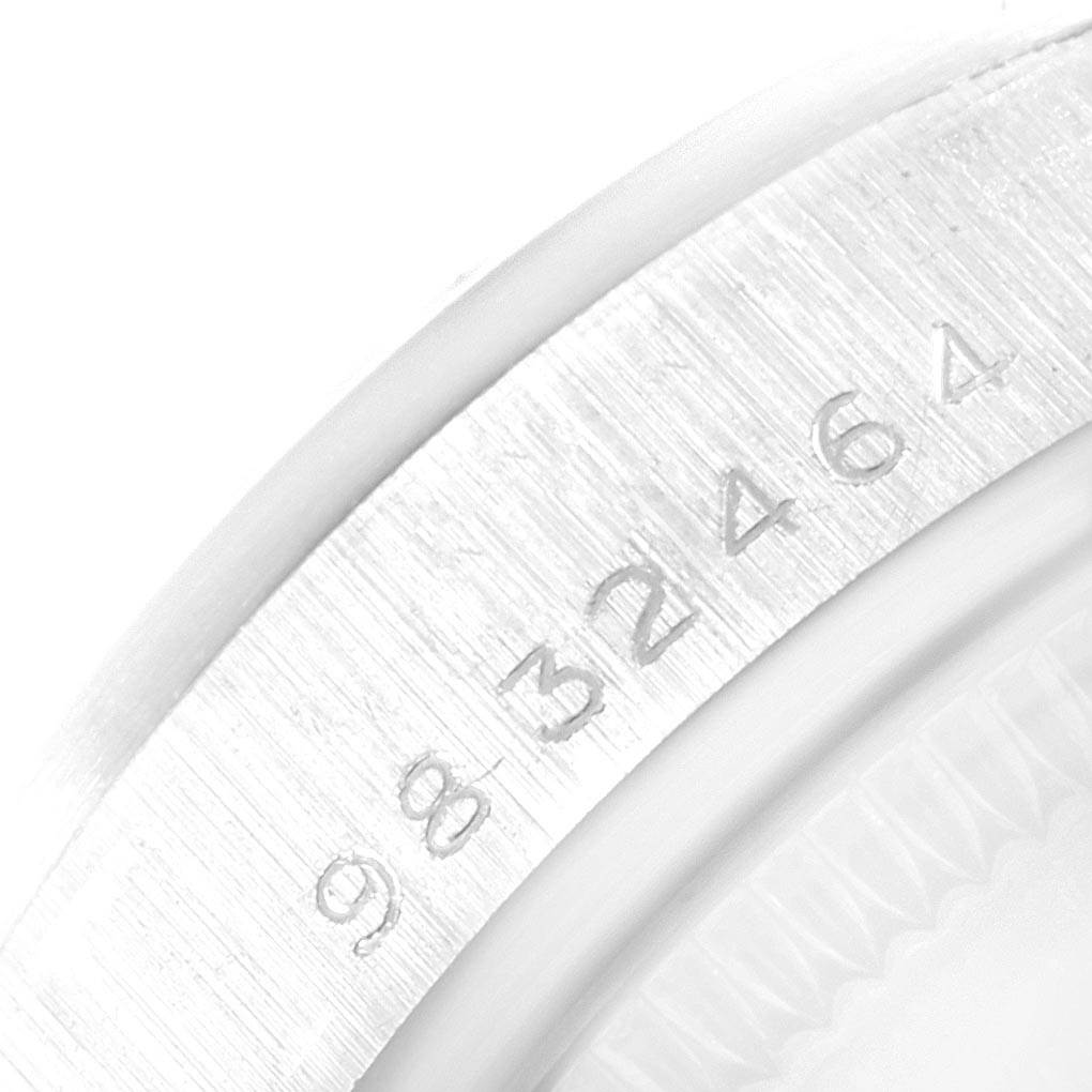 This image shows a close-up of the serial number engraved on the case of a Rolex President 68279 Women's White Gold Silver Dial 68279 Women's White Gold Silver Dial model watch.
