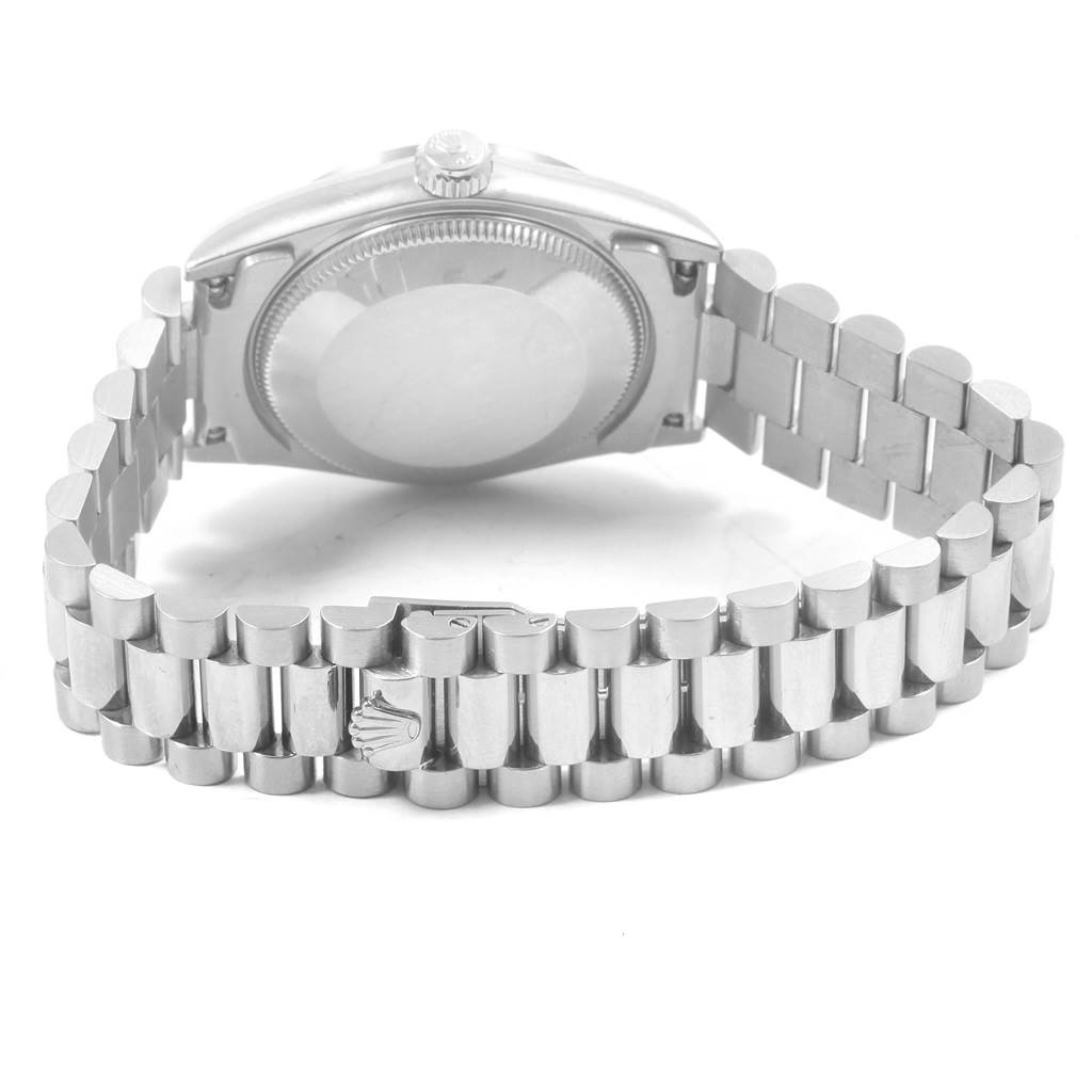 The image shows the back view of a Rolex President 68279 Women's White Gold Silver Dial 68279 Women's White Gold Silver Dial model watch, highlighting its case back and bracelet with the Rolex emblem.