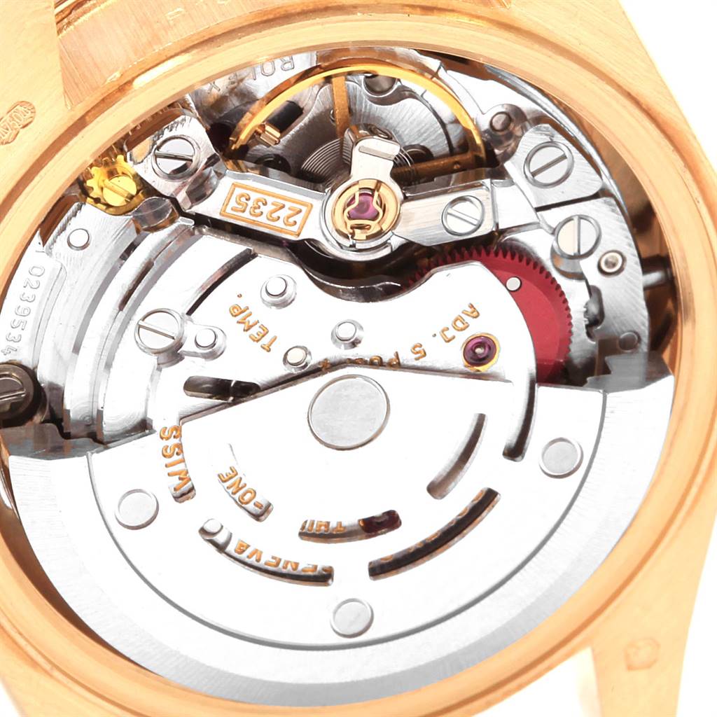 The image shows an up-close view of the movement mechanism of a Rolex President 79088 Women
s Yellow Gold Mother of Pearl Dial 79088 Women
s Yellow Gold Mother of Pearl Dial model watch.