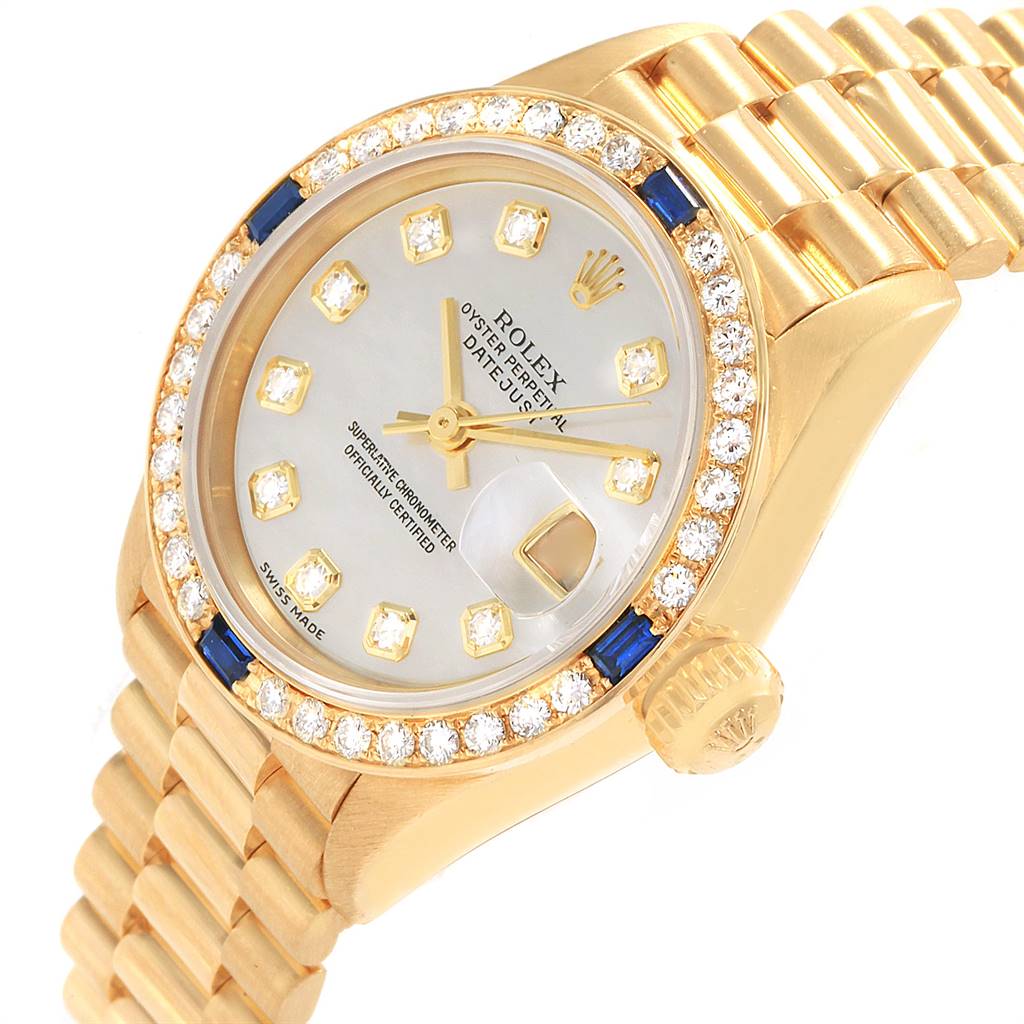 This image shows a close-up view of the face, bezel, and part of the band of a Rolex President 79088 Women
s Yellow Gold Mother of Pearl Dial 79088 Women
s Yellow Gold Mother of Pearl Dial model watch.