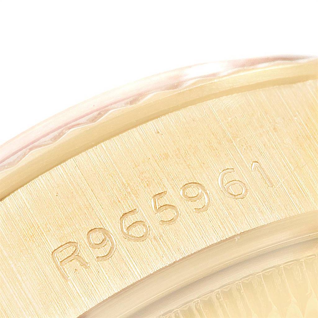 This image shows a close-up of the serial number engraved on the side of the Rolex President 69178 Women
s Yellow Gold Champagne Dial 69178 Women
s Yellow Gold Champagne Dial model watch.