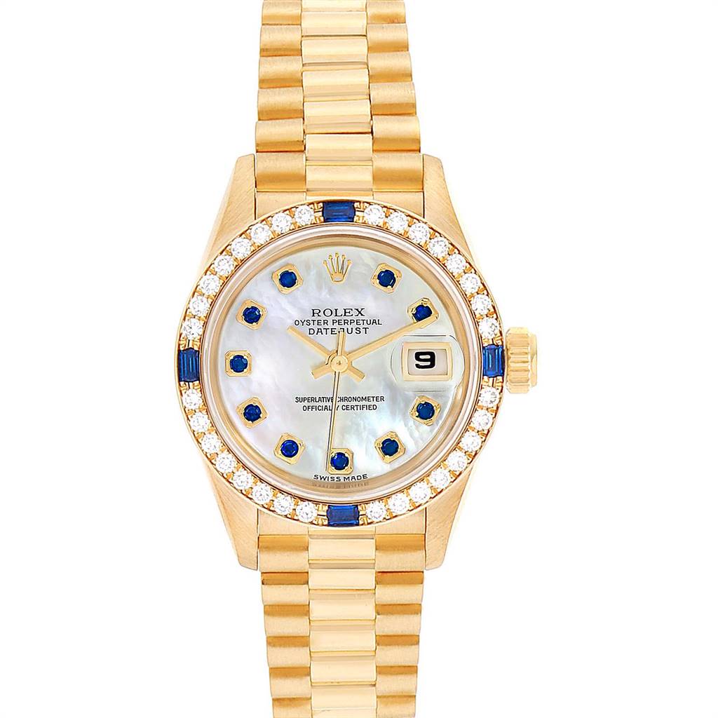 This image shows a Rolex President 79088 Women's Yellow Gold Mother of Pearl Dial 79088 Women's Yellow Gold Mother of Pearl Dial model watch from a top-down angle, displaying the face, bezel, and bracelet.