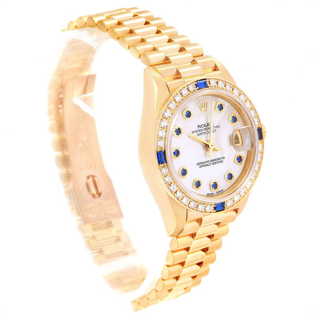 This Rolex President 79088 Women's Yellow Gold Mother of Pearl Dial 79088 Women's Yellow Gold Mother of Pearl Dial model watch is shown at a slight angle displaying its face, bracelet, and a portion of the side of the case.