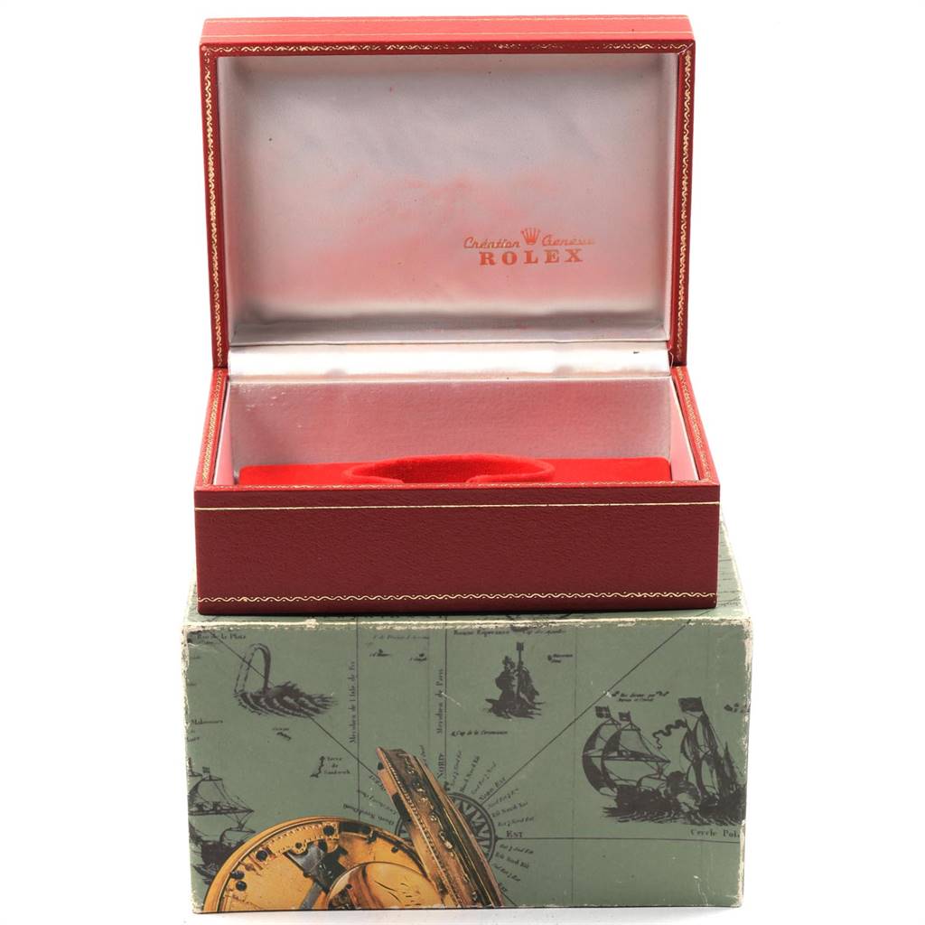 The image shows an open, empty Rolex President 79088 Women's Yellow Gold Mother of Pearl Dial 79088 Women's Yellow Gold Mother of Pearl Dial watch box with a red exterior and a decorative outer box.
