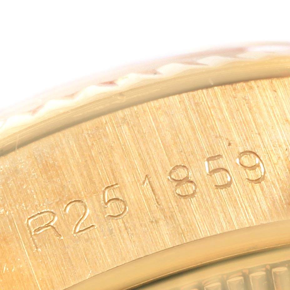 This close-up image shows the serial number engraved on the side of the case of a Rolex President 69178 Women
s Yellow Gold Silver Dial 69178 Women
s Yellow Gold Silver Dial model watch.