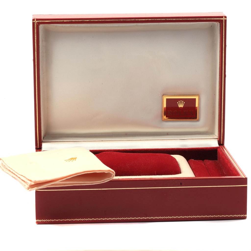 The image shows an open red and white watch box for a Rolex President 69178 Women
s Yellow Gold Silver Dial 69178 Women
s Yellow Gold Silver Dial model, including a cleaning cloth inside.