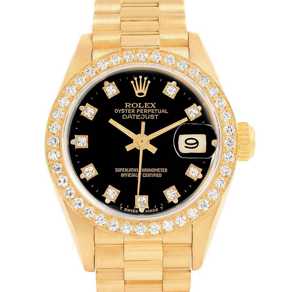 The image shows a front view of the Rolex President 69138 Women's Yellow Gold Black Dial 69138 Women's Yellow Gold Black Dial model watch, highlighting its black dial, diamond markers, and gold bracelet.