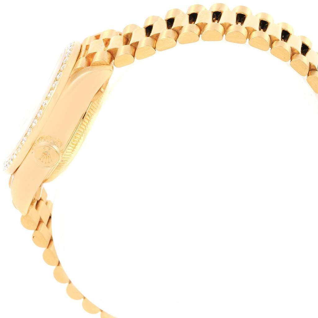 The image shows a side view of a Rolex President 69138 Women's Yellow Gold Black Dial 69138 Women's Yellow Gold Black Dial model watch, highlighting its band and case.