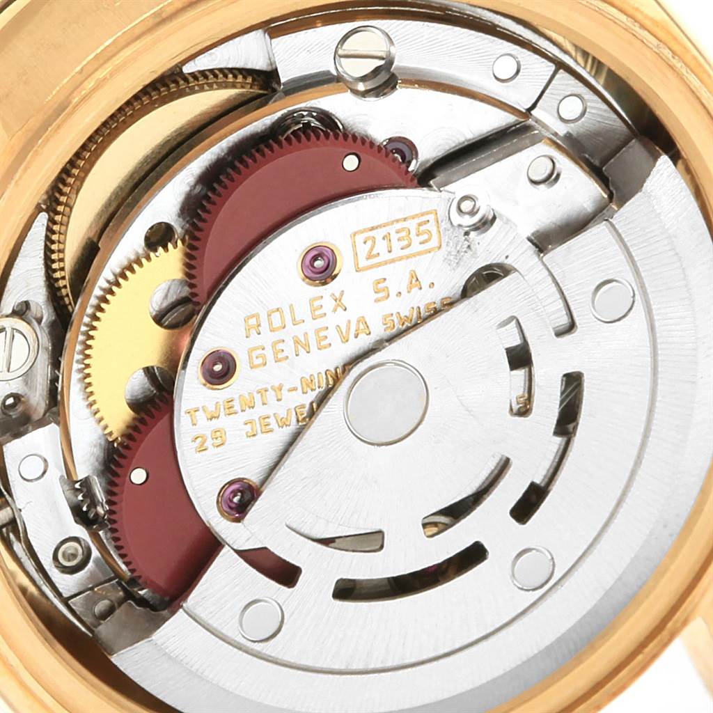 The image shows a close-up view of the internal movement components of a Rolex President 69138 Women's Yellow Gold Black Dial 69138 Women's Yellow Gold Black Dial model watch.