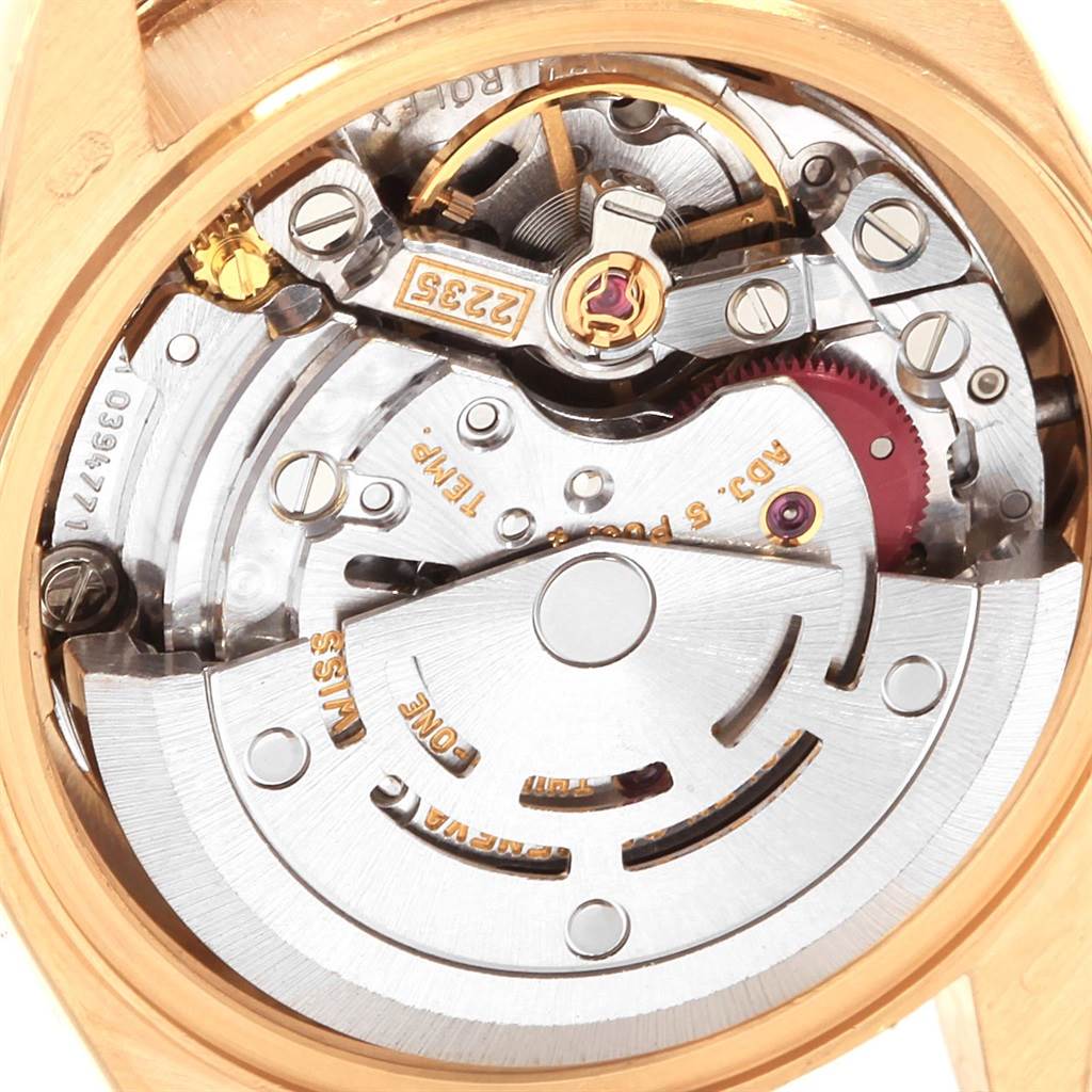 This close-up shows the intricate internal movement components of the Rolex President 79138 Women's Yellow Gold Mother of Pearl Dial 79138 Women's Yellow Gold Mother of Pearl Dial watch model.