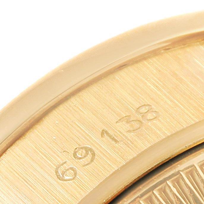 This close-up image shows the engraved model number on the caseback edge of the Rolex President 69178 Women
s Yellow Gold Champagne Dial 69178 Women
s Yellow Gold Champagne Dial watch.