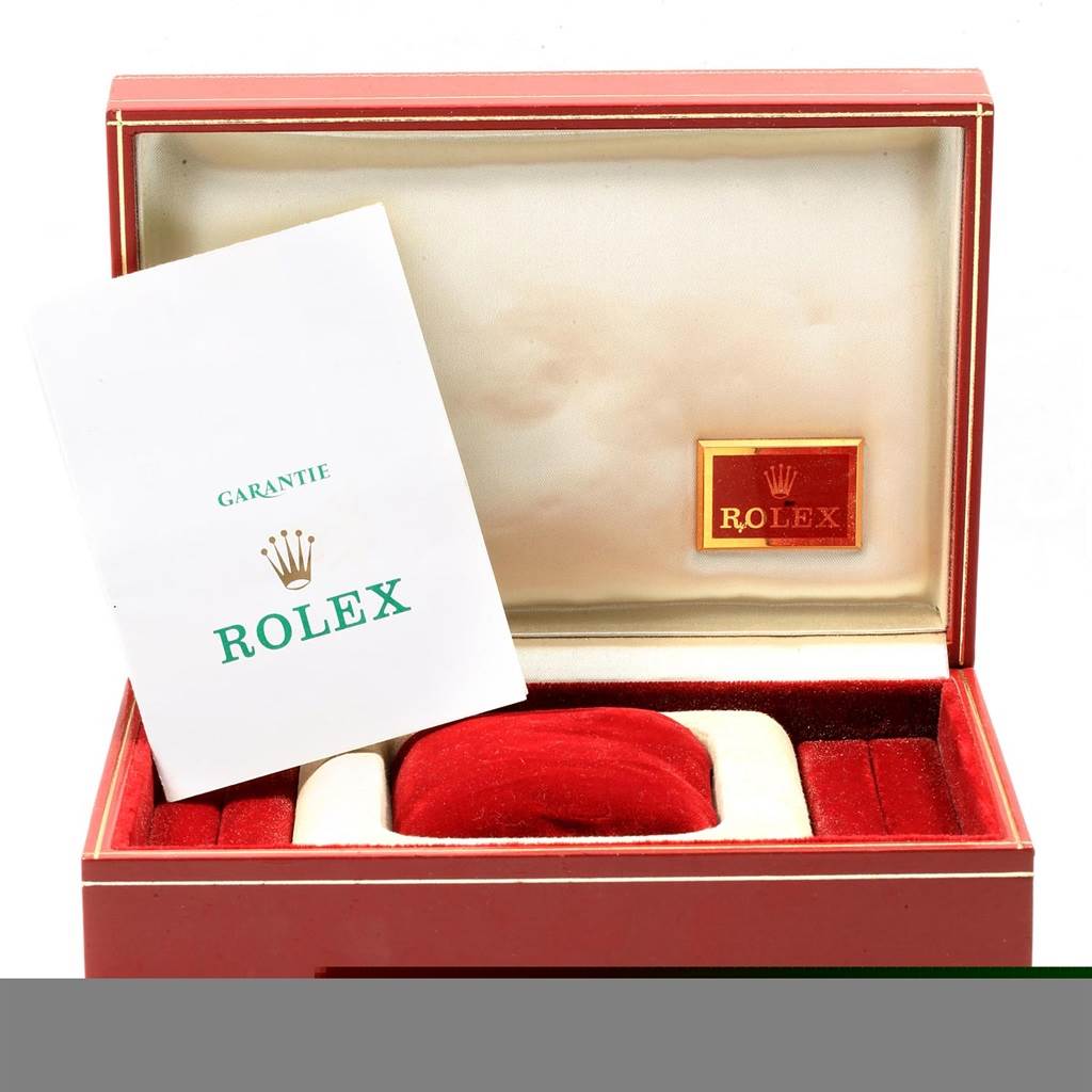 The image shows a Rolex President 69178 Women
s Yellow Gold Champagne Dial 69178 Women
s Yellow Gold Champagne Dial model box with a warranty booklet inside.