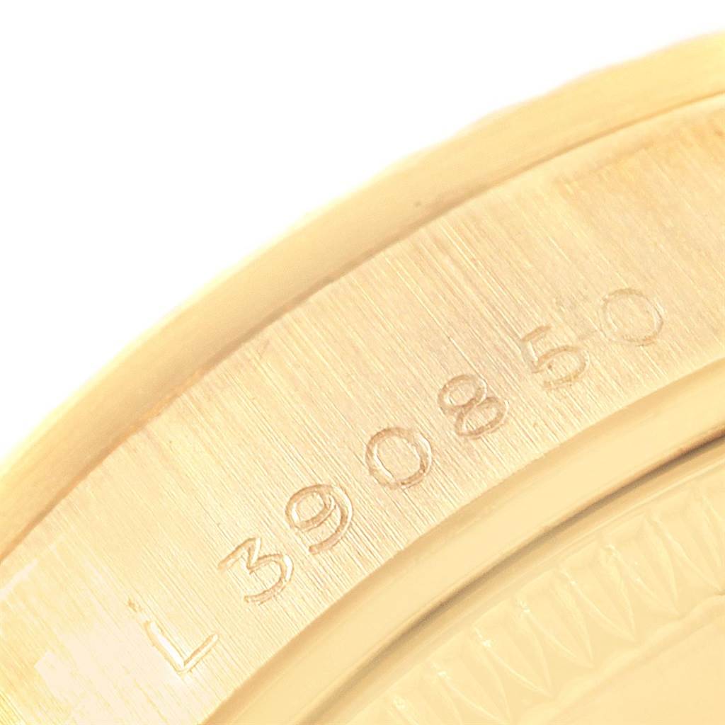 The image shows a close-up of the serial number engraving on the Rolex President 68278 Women's Yellow Gold White Dial 68278 Women's Yellow Gold White Dial model watch.