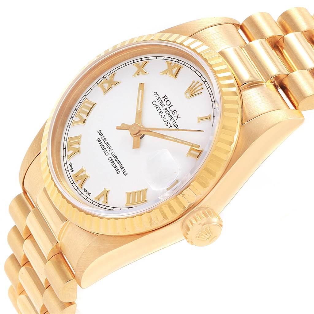 The image shows a Rolex President 68278 Women's Yellow Gold White Dial 68278 Women's Yellow Gold White Dial model watch at a diagonal angle, highlighting its gold case, bracelet, and white dial with Roman numerals.