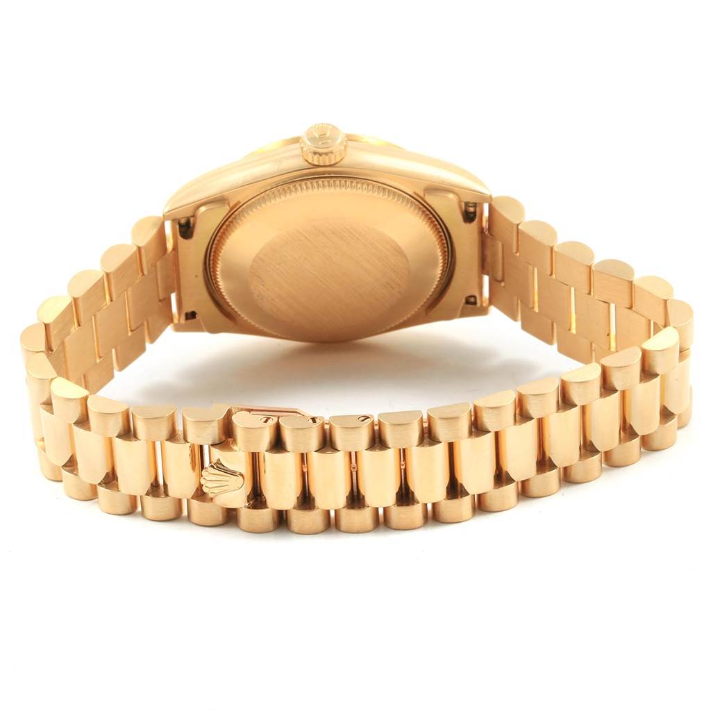 This image shows the back view of a Rolex President 68278 Women's Yellow Gold White Dial 68278 Women's Yellow Gold White Dial model watch, highlighting the case back and the iconic President bracelet.