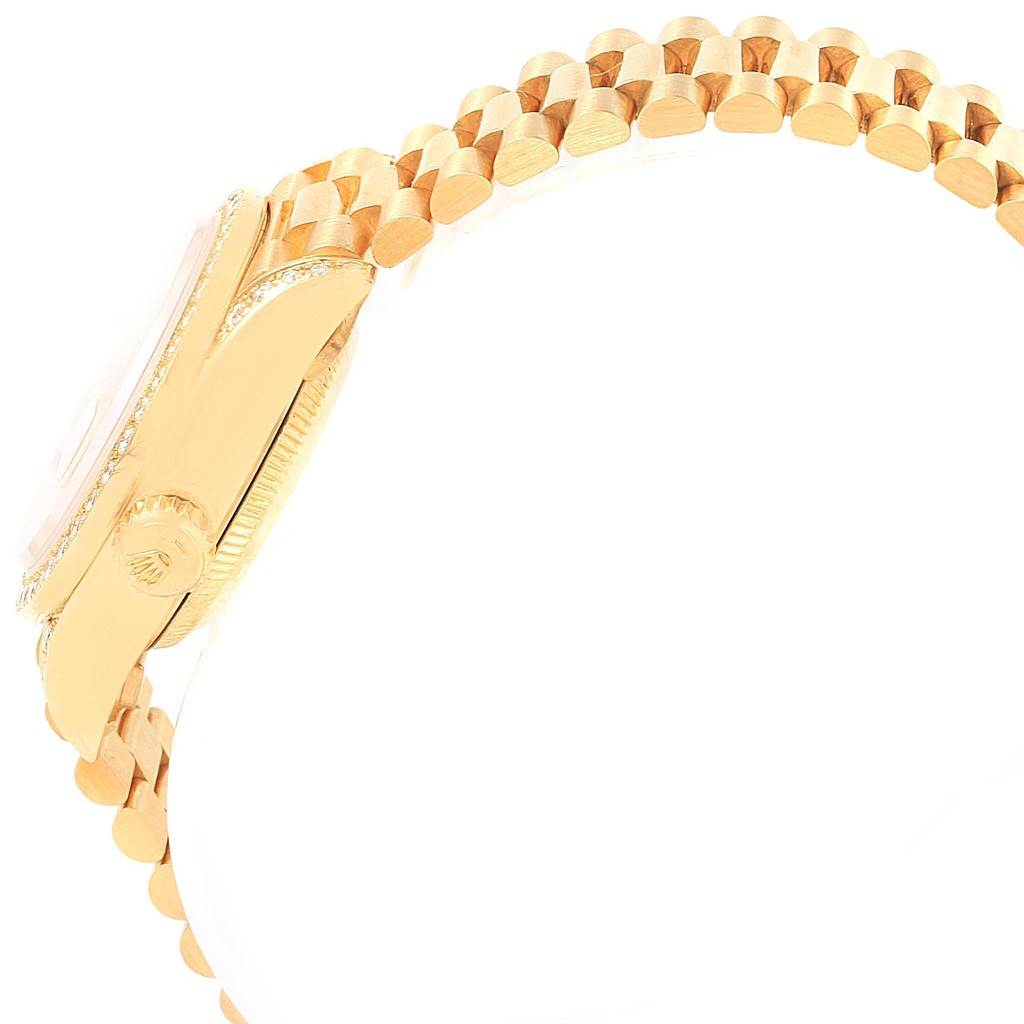 This image shows a side view of a Rolex President 69158 Women's Yellow Gold Silver Dial 69158 Women's Yellow Gold Silver Dial model, highlighting the crown, case, and part of the bracelet.
