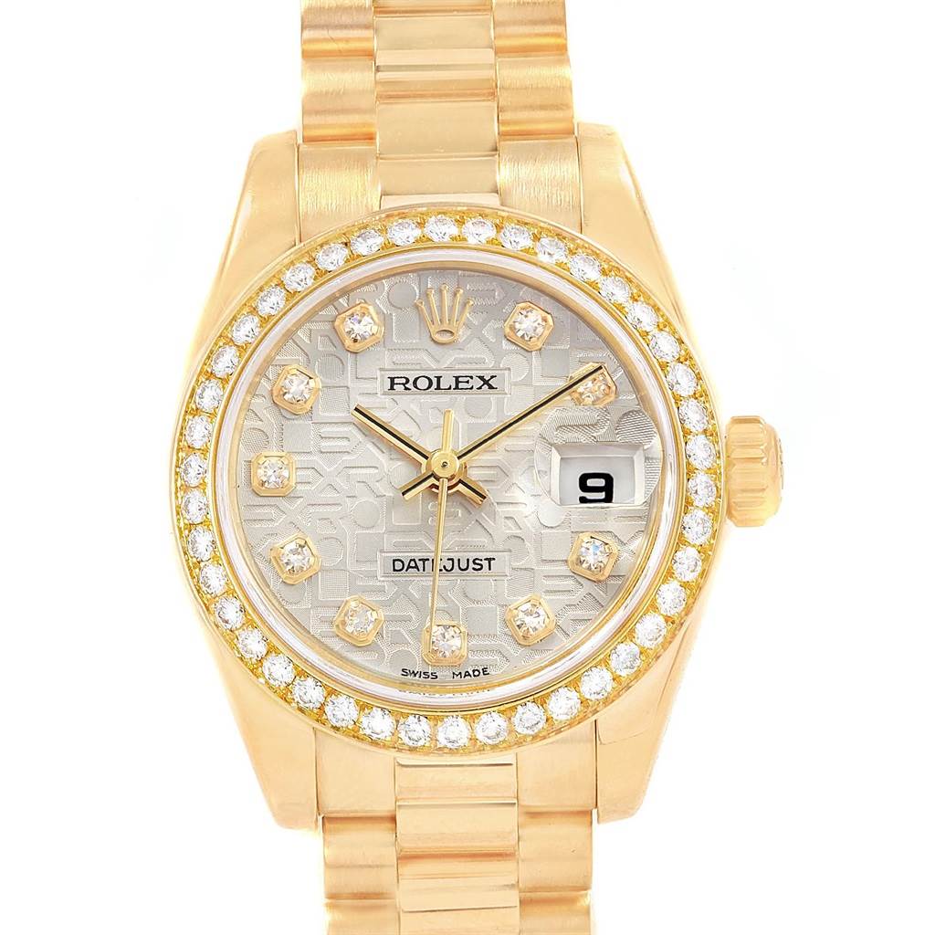 The image shows a Rolex President 179138 Women's Yellow Gold Silver Dial 179138 Women's Yellow Gold Silver Dial model watch from a front angle, featuring a gold band, diamond bezel, and date display.