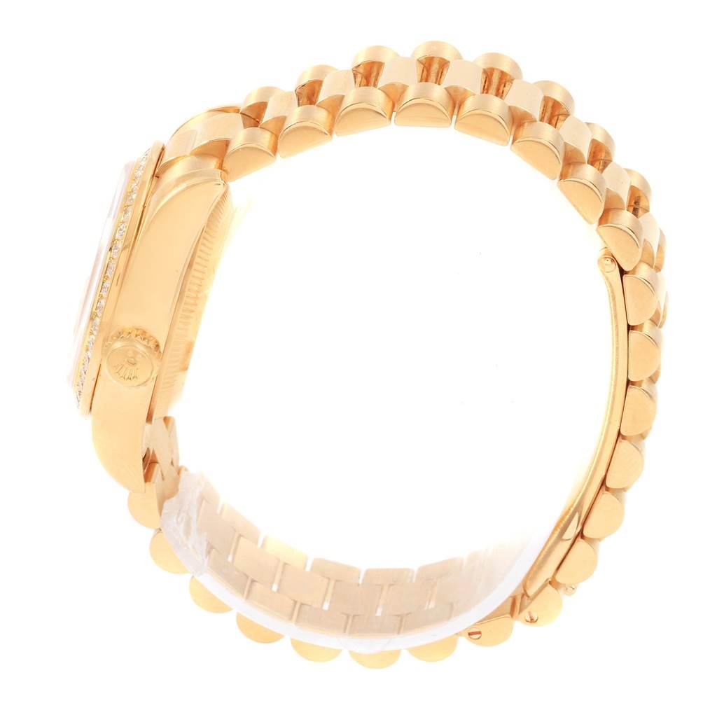 This image shows the side view and part of the band of a Rolex President 179138 Women's Yellow Gold Silver Dial 179138 Women's Yellow Gold Silver Dial model watch.