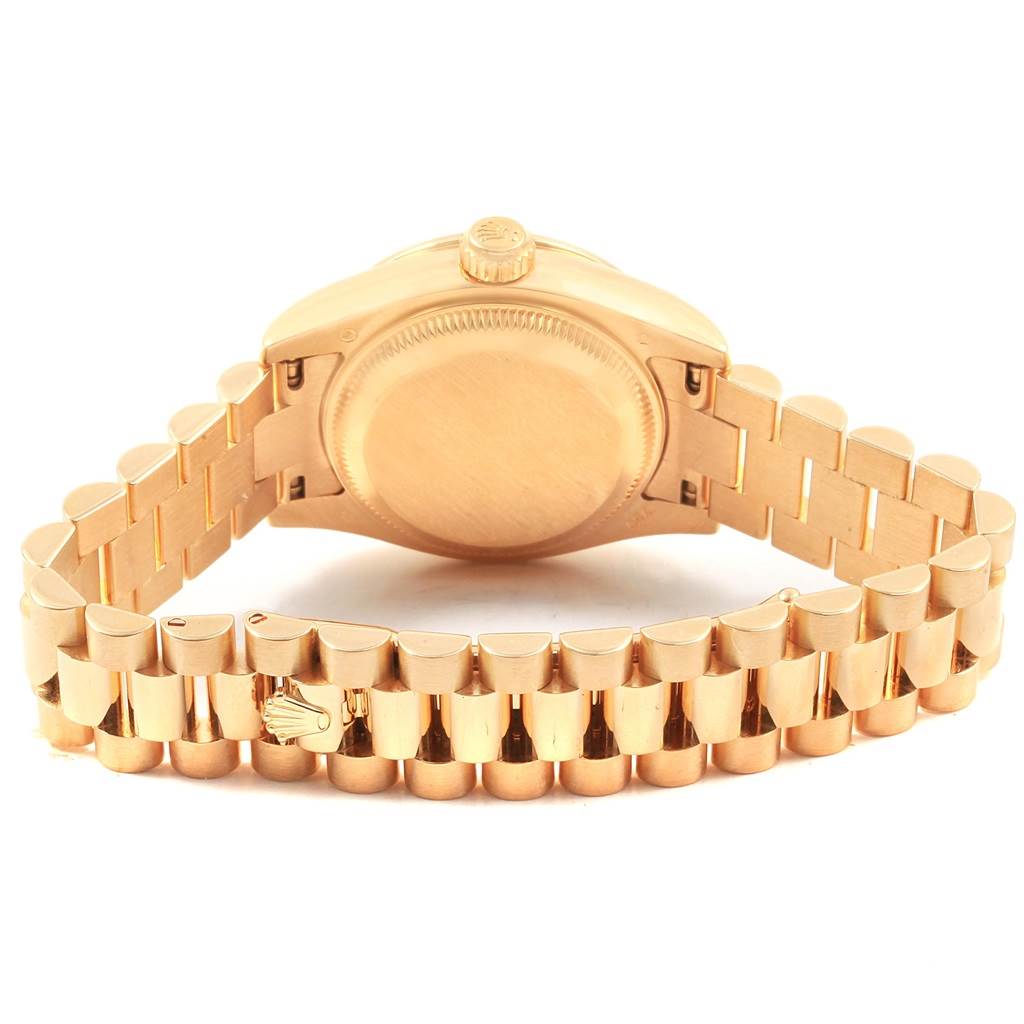 The image shows the back and bracelet of the gold Rolex President 179138 Women's Yellow Gold Silver Dial 179138 Women's Yellow Gold Silver Dial model watch from a rear angle.