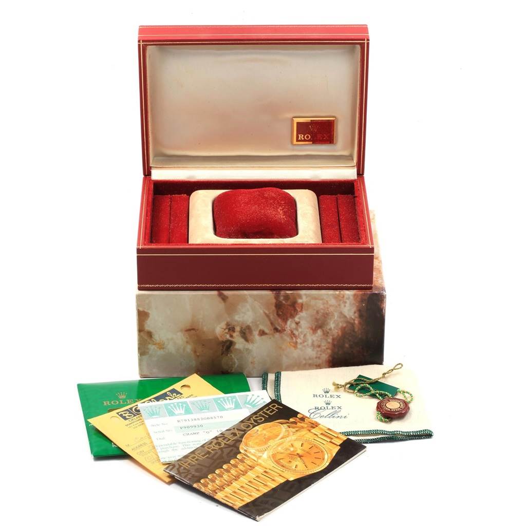 The image shows a Rolex President 79138 Women's Yellow Gold Champagne Dial 79138 Women's Yellow Gold Champagne Dial model watch box, documents, tags, and a Rolex cloth.