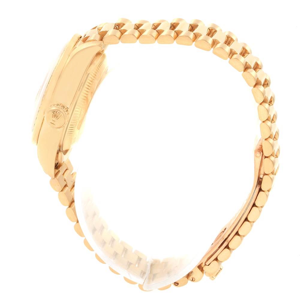 This image shows a side view of a Rolex President 79138 Women's Yellow Gold Champagne Dial 79138 Women's Yellow Gold Champagne Dial model watch, highlighting the crown, case, and bracelet.