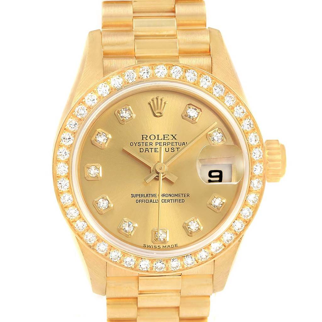 This is a front view of a Rolex President 79138 Women's Yellow Gold Champagne Dial 79138 Women's Yellow Gold Champagne Dial model watch, showing its gold case, diamond bezel, dial, and bracelet.