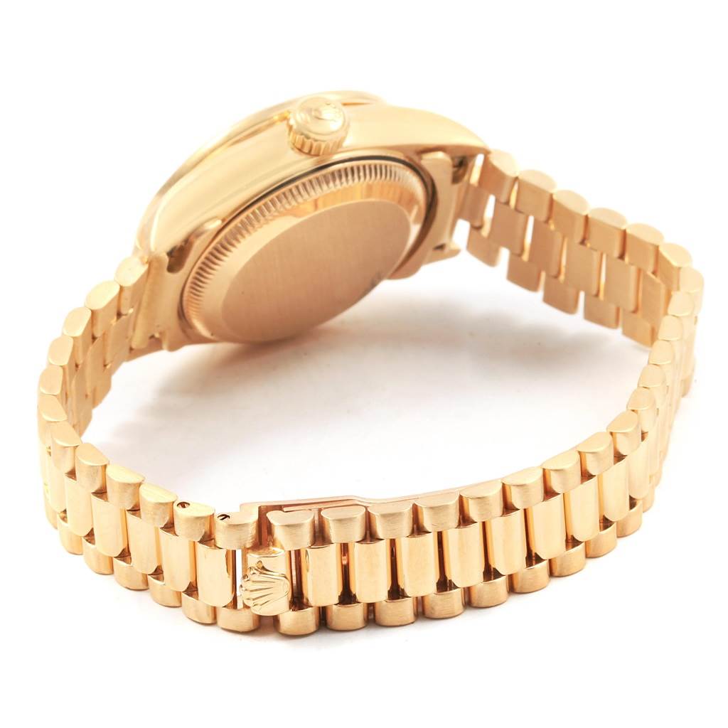 The image shows the side and back view of a Rolex President 79138 Women's Yellow Gold Champagne Dial 79138 Women's Yellow Gold Champagne Dial model watch, highlighting the clasp and bracelet links.