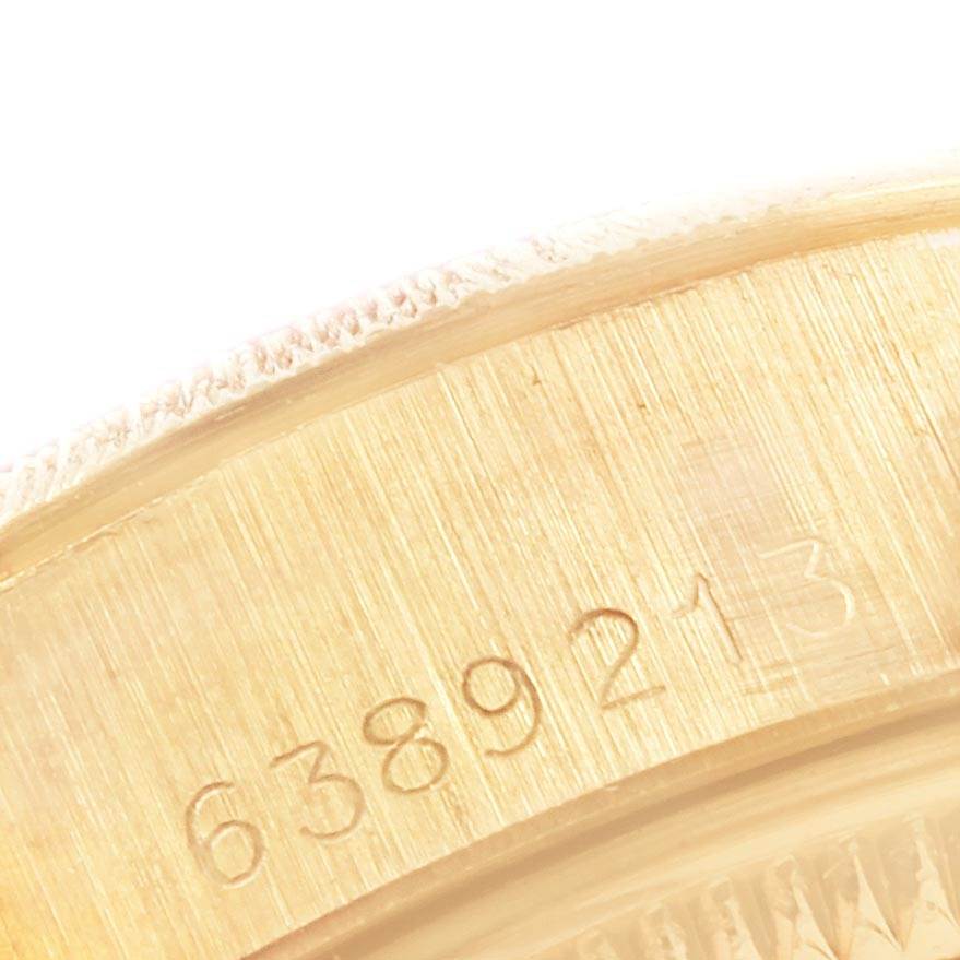 The image shows a close-up of the serial number on the Rolex President 6927 Women's Yellow Gold Champagne Dial 6927 Women's Yellow Gold Champagne Dial model watch.