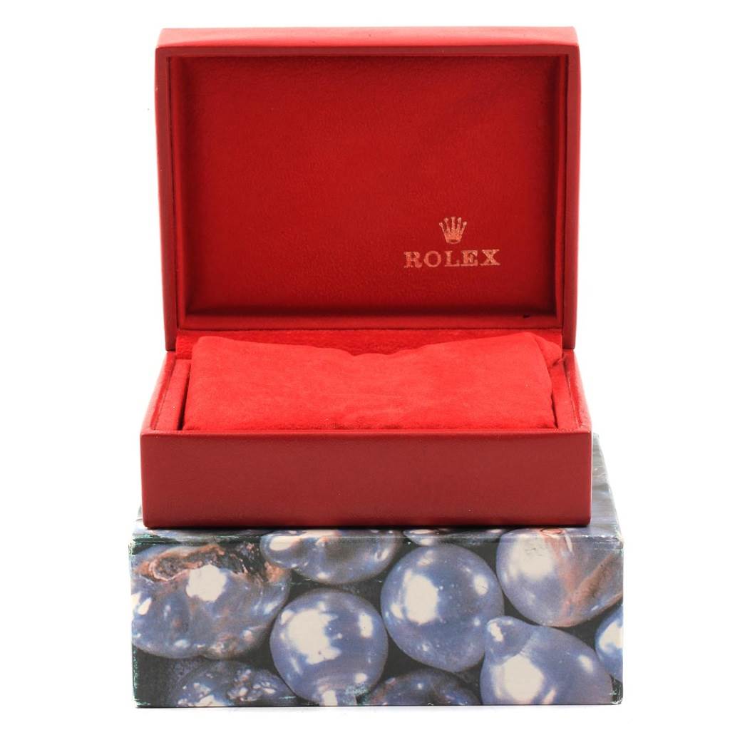 The image shows an open Rolex President 67188 Women's Yellow Gold Silver Dial 67188 Women's Yellow Gold Silver Dial model watch box in red with a pillow insert, seen from the front angle.