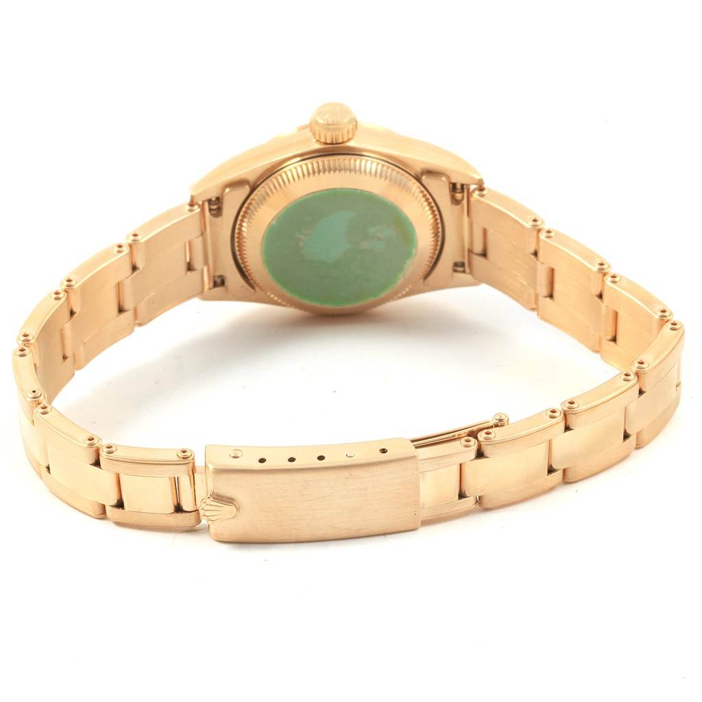 This image shows the back view of a Rolex President 67188 Women's Yellow Gold Silver Dial 67188 Women's Yellow Gold Silver Dial model watch, highlighting the bracelet, case back, and clasp.