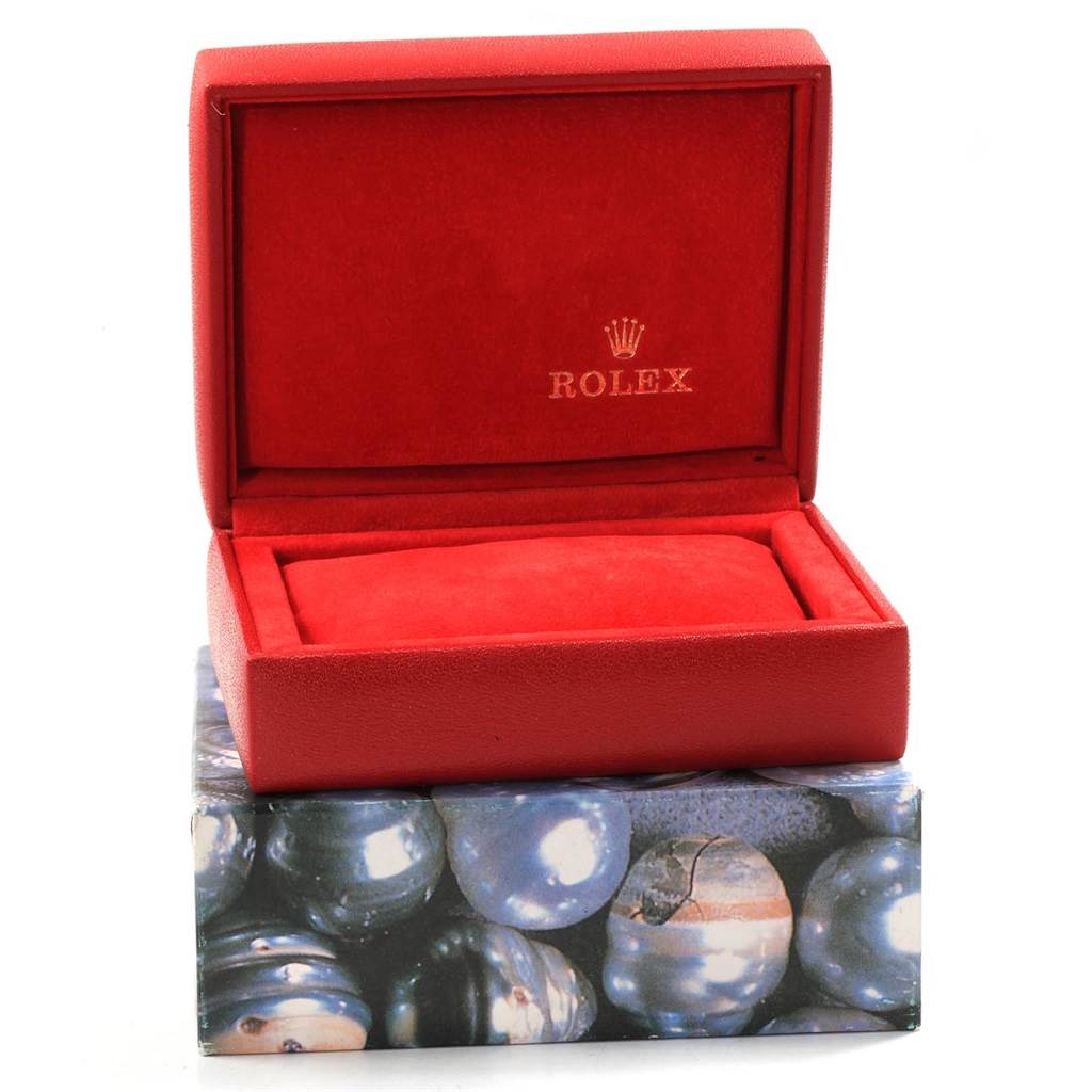 The image shows a red Rolex President 69158 Women's Yellow Gold Blue Dial 69158 Women's Yellow Gold Blue Dial watch box with the lid open, displaying the brand name and logo inside.