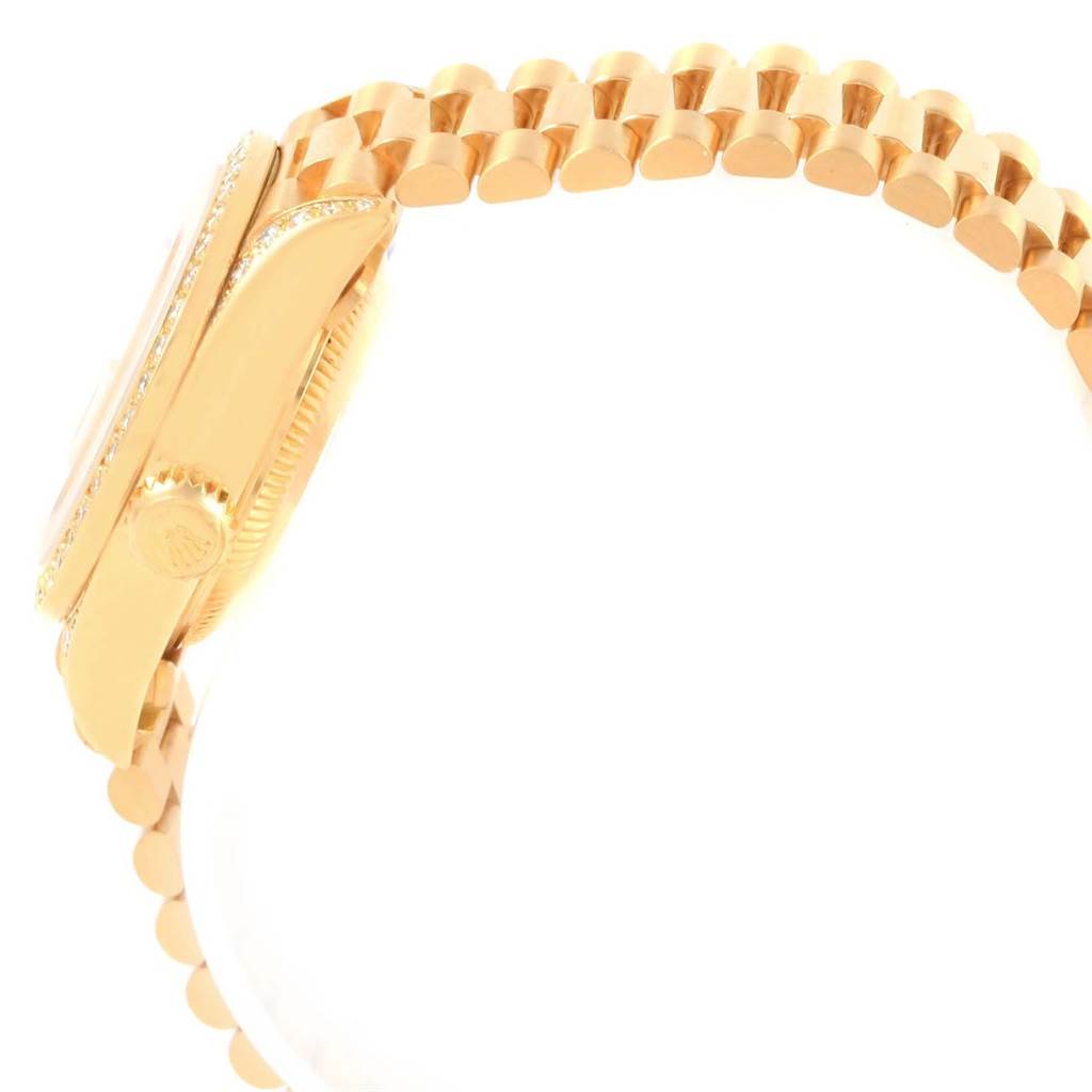 The image shows a side view of a Rolex President 69158 Women's Yellow Gold Blue Dial 69158 Women's Yellow Gold Blue Dial model watch, highlighting parts of the bracelet, case, and crown.