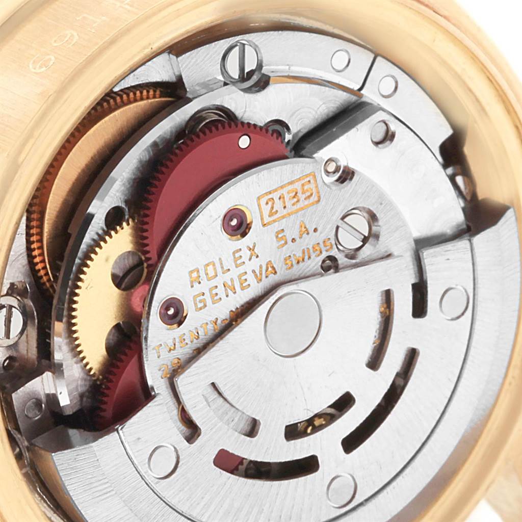 This image shows a close-up view of the internal movement mechanism of a Rolex President 69158 Women's Yellow Gold Blue Dial 69158 Women's Yellow Gold Blue Dial model watch.