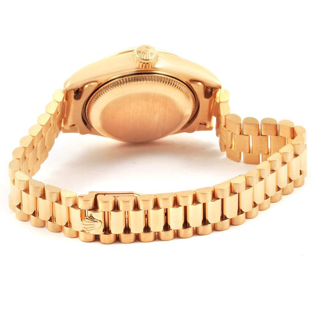 The image shows the back and bracelet of a Rolex President 69178 Women
s Yellow Gold Champagne Dial 69178 Women
s Yellow Gold Champagne Dial model watch from a slightly angled, bottom-up view.