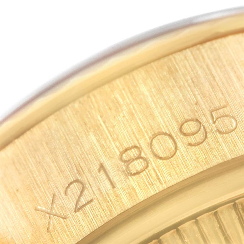 This image shows a close-up of the serial number engraving on the Rolex President 69178 Women
s Yellow Gold Champagne Dial 69178 Women
s Yellow Gold Champagne Dial model watch case.