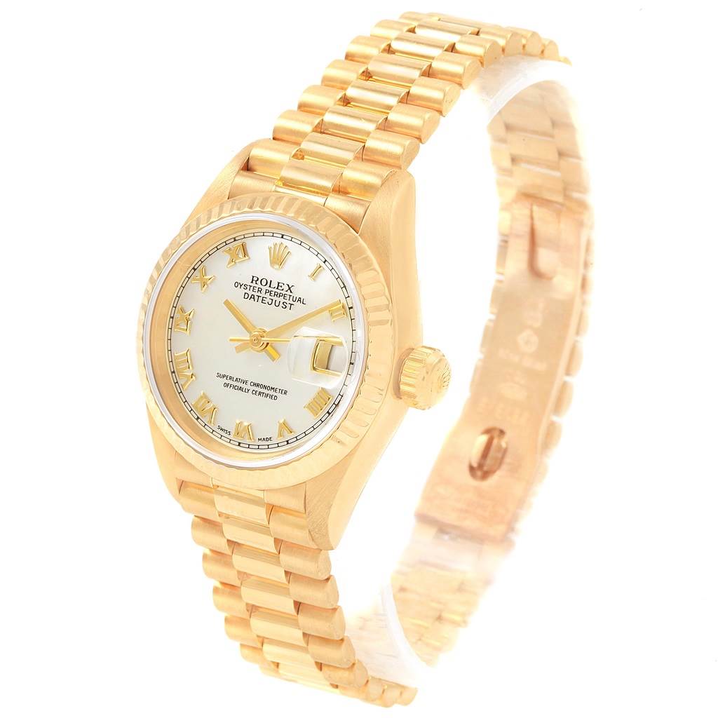 The image shows a gold Rolex President 69178 Women
s Yellow Gold Mother of Pearl Dial 69178 Women
s Yellow Gold Mother of Pearl Dial model watch, displaying its face, bracelet, crown, and clasp at a slight angle.